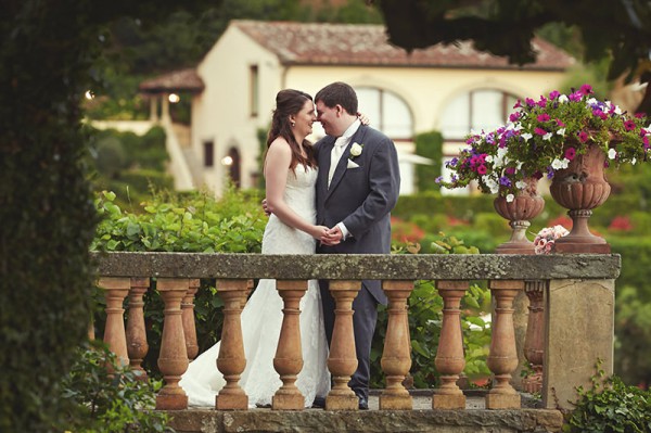 The bride and groom on a balcony