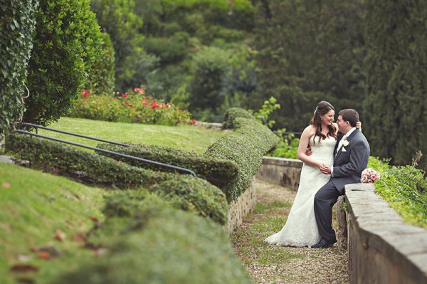 The bride sitting on the groom's lap