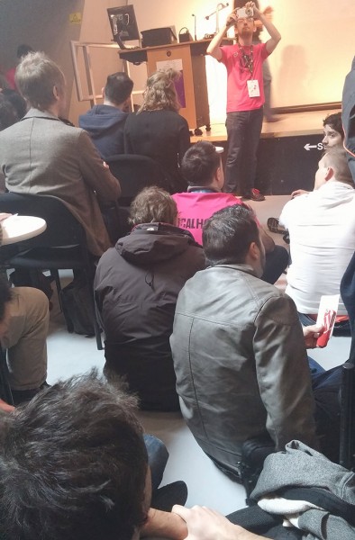 People sitting on the floor at the WP REST API panel