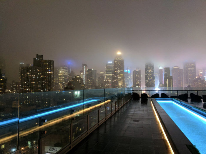 Misty rooftop view of New York City